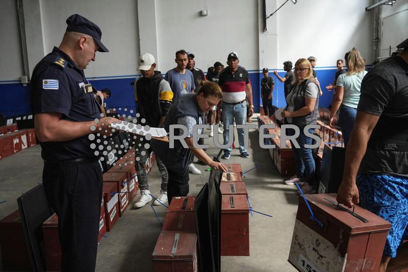 Uruguay votes for next president in closely fought runoff race