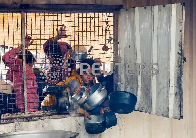 Israeli army orders Gaza City suburb evacuated, spurring new displacement wave