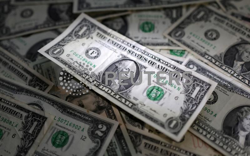 Dollar slips with bond yields on Treasury nomination