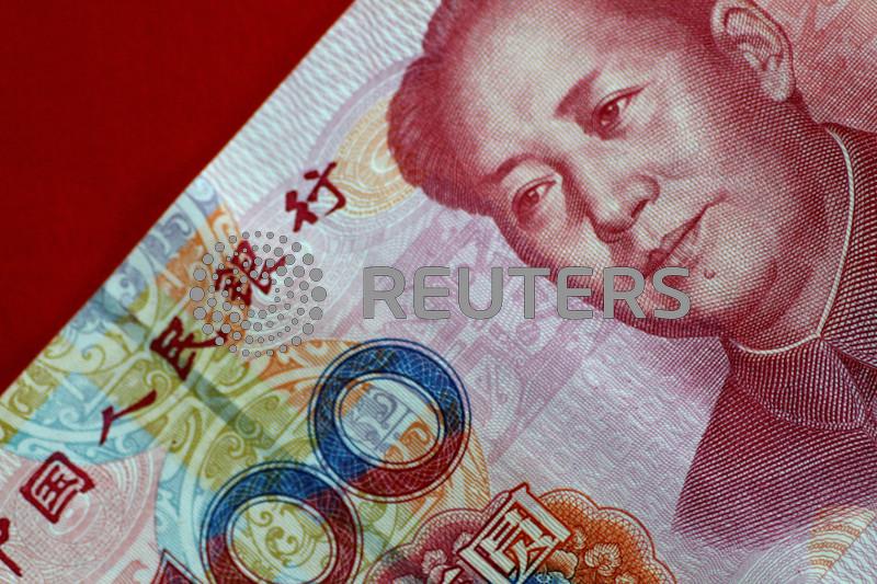 China's yuan slides to 4-month low on tariff threats and mixed PMI data
