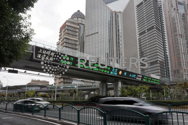 China Politburo policy shift spurs surge in stocks, bonds