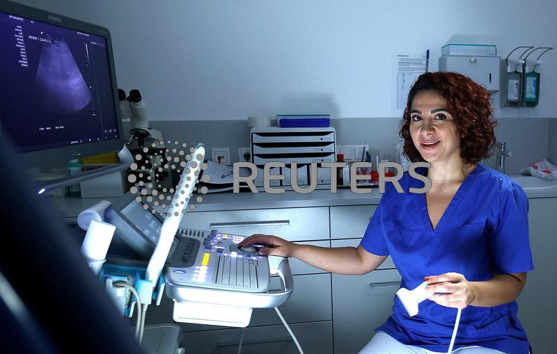 Their labour in demand, Germany's Syrians are in no rush to leave