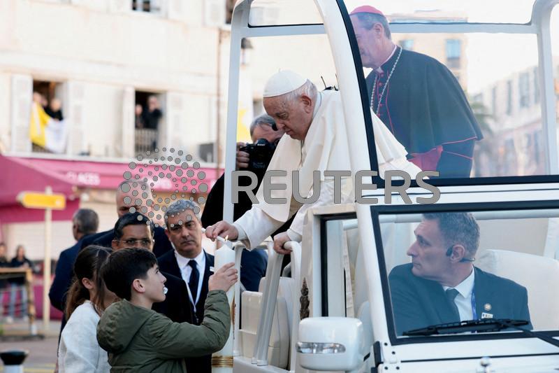 Pope Francis, in Corsica, warns against religion that stokes divisions