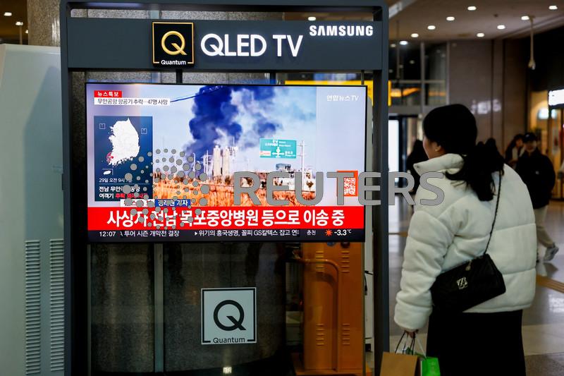 At least 62 dead, two crew rescued in fiery South Korea airliner crash