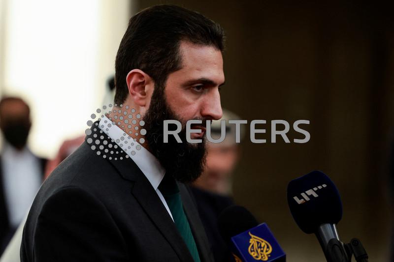 Syria's de facto leader says holding elections could take up to four years