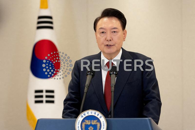 South Korea investigators request arrest warrant for Yoon over martial law