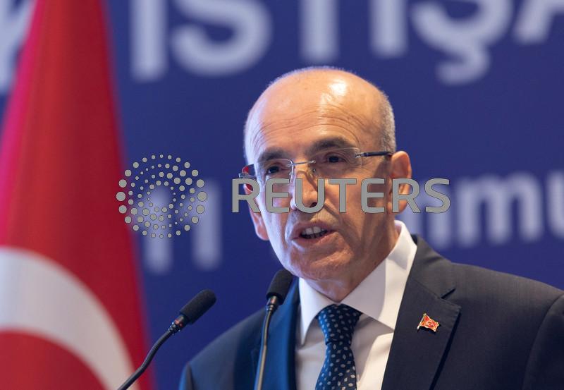 Turkey's fuel, tobacco tax moves will not harm inflation goal, Simsek says