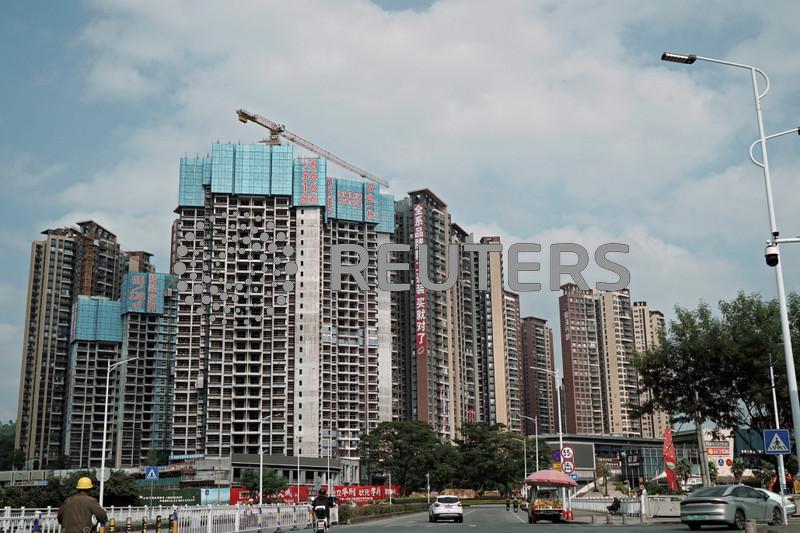 China December new home prices rise a touch faster, survey shows