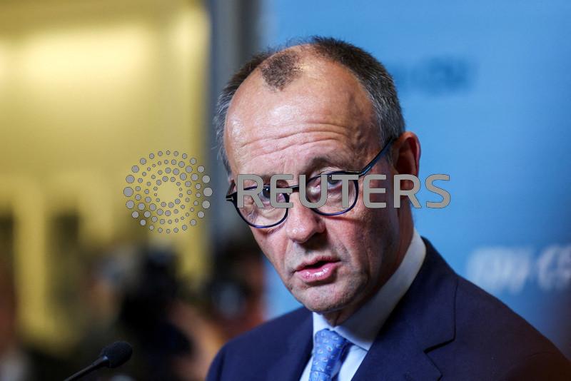 German opposition's chancellor candidate backs free trade talks with Trump