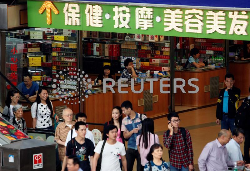 China gives government workers first big pay bump in a decade to boost economy