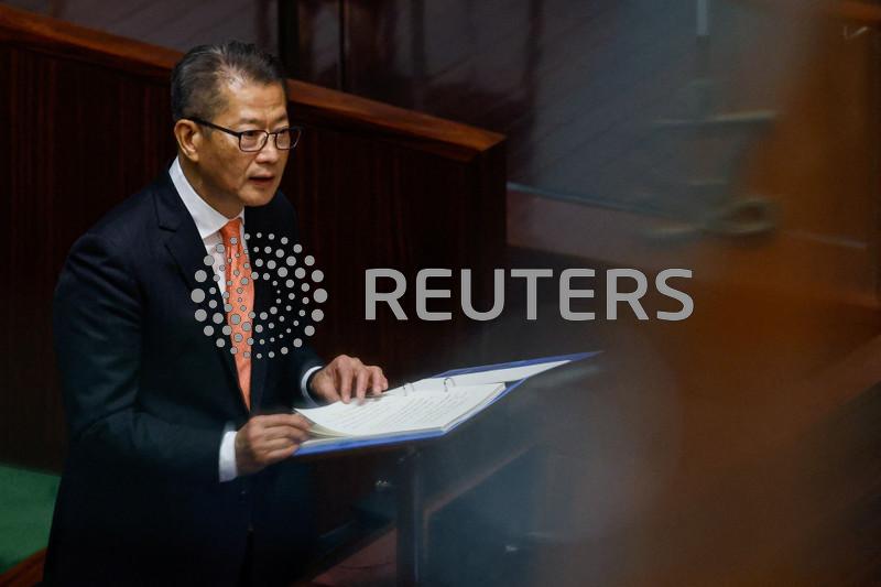 Hong Kong budget deficit to be just under HK$100 billion, financial chief says