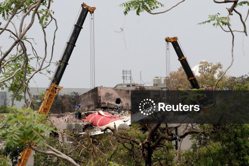 U.S. officials survey Air India crash site, families continue to wait for bodies