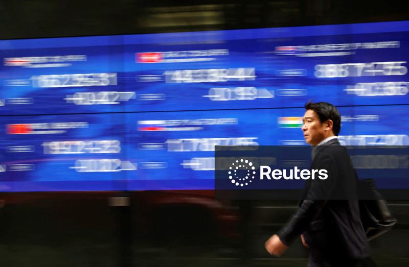 Asia shares pulled higher by Nikkei surge, China GDP beats