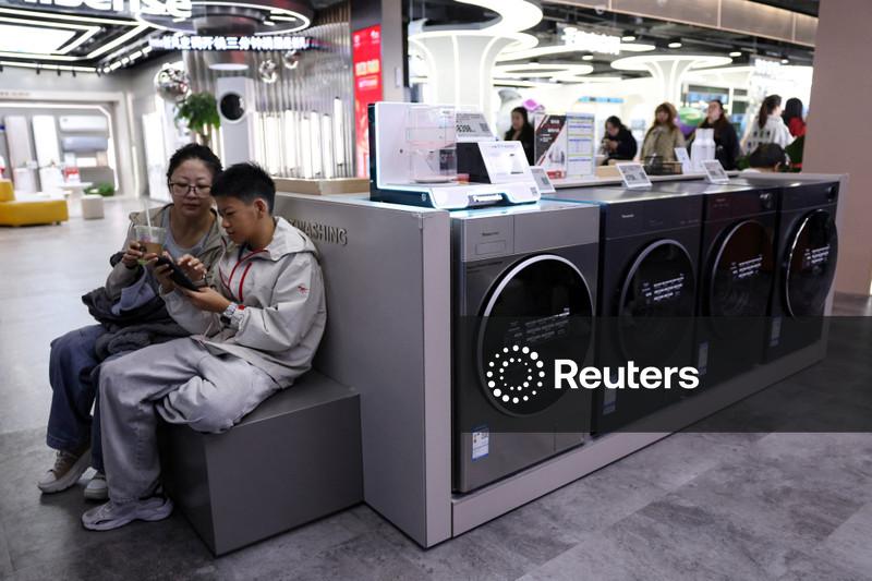 China's Q3 GDP growth slows to one-year low in test of long-term policy plans