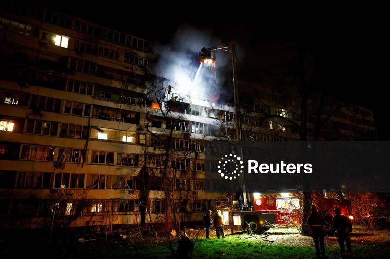 Russian drones trigger fires in Kyiv dwellings, killing one, officials say