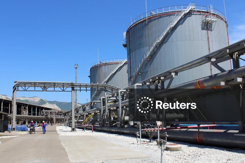 Oil dips on oversupply concerns while investors eye Ukraine talks