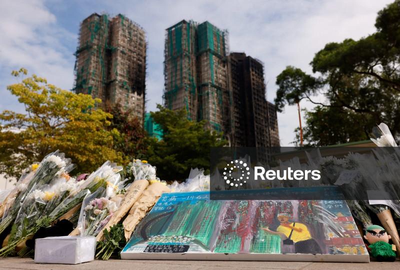 Hong Kong orders judge-led probe into fire that killed 151