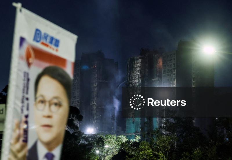 Hong Kong faces low election turnout as residents mourn deadly fire
