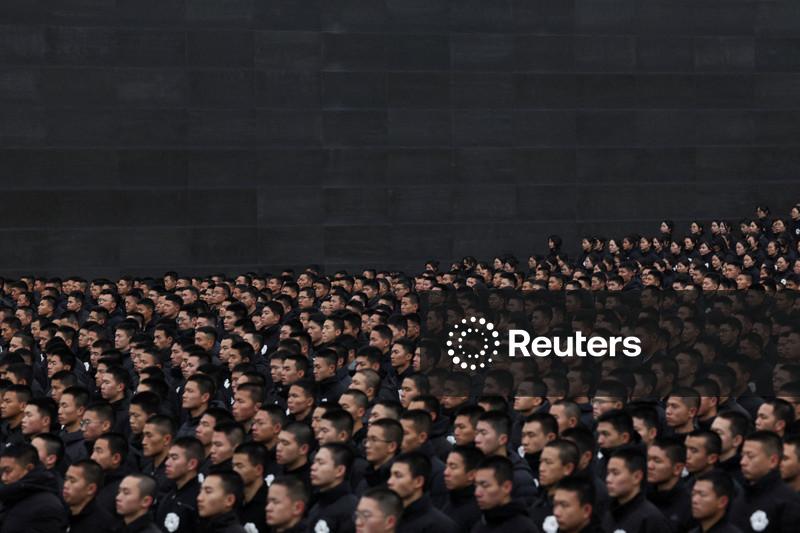 China holds low-key Nanjing Massacre memorial despite Japan tensions