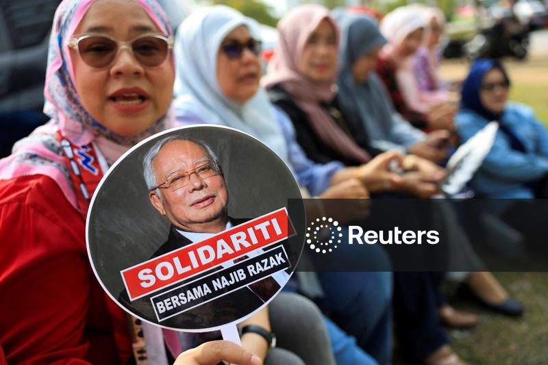 Malaysia denies ex-PM Najib's house arrest bid ahead of key 1MDB verdict