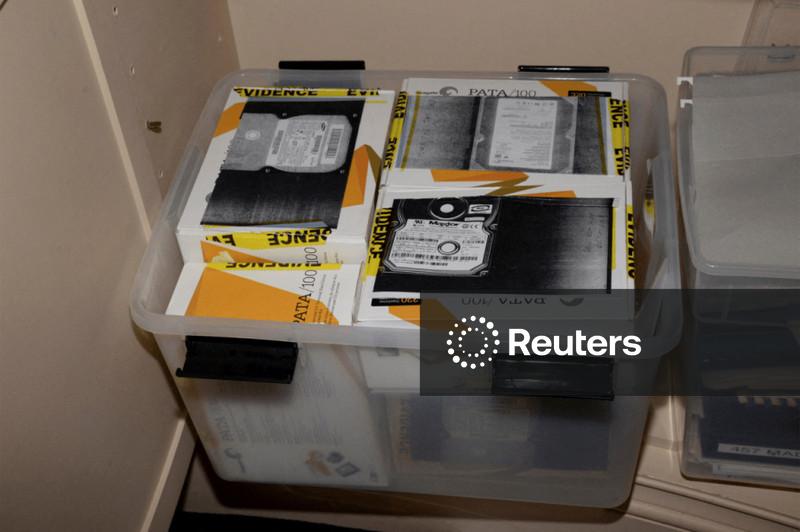 Justice Department restores Trump photo to public database of Epstein files