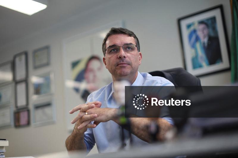 Jair Bolsonaro backs son's Brazil presidential bid, undergoes hernia surgery