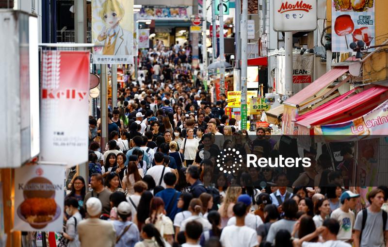 Japan proposes record budget spending while curbing fresh debt