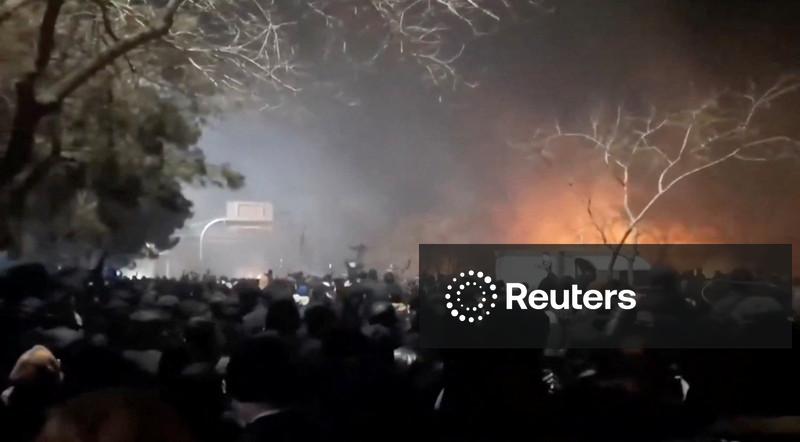 Confronting protests, Iran vows to strike back if U.S. attacks