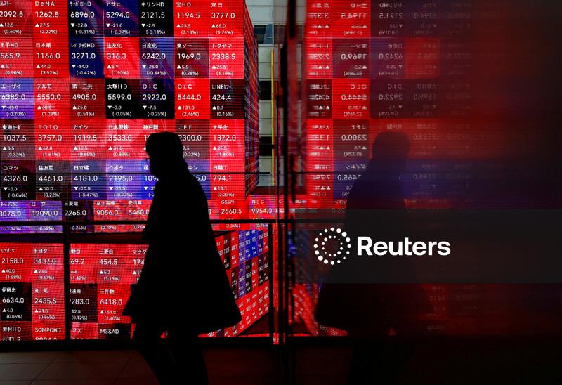 Japan snap election bets push stocks to record highs, sink yen and bonds