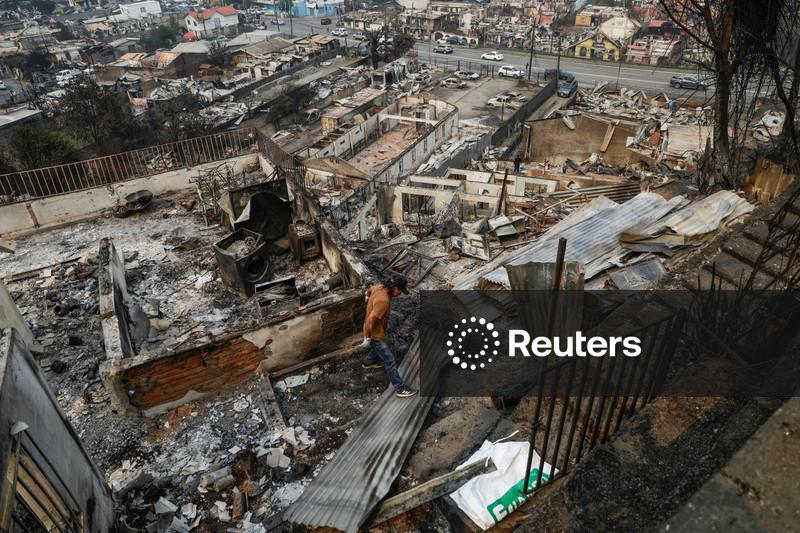 Chile wildfires kill 19 amid extreme heat; scores evacuated