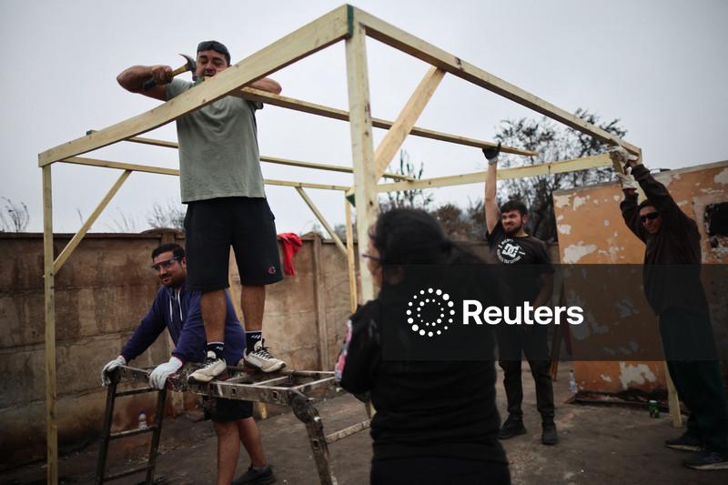 Chile’s fire-ravaged communities pull together as frustrations mount over state response