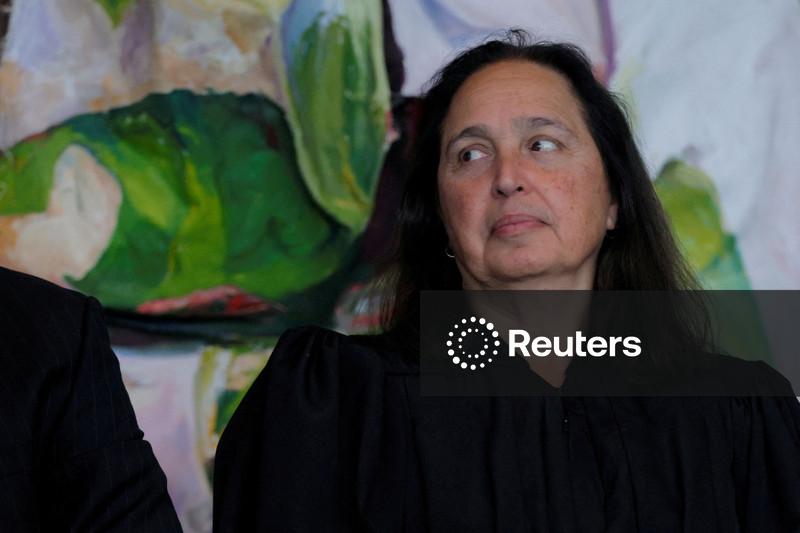 US judge blocks Trump administration's push to end legal status of 8,400 migrants