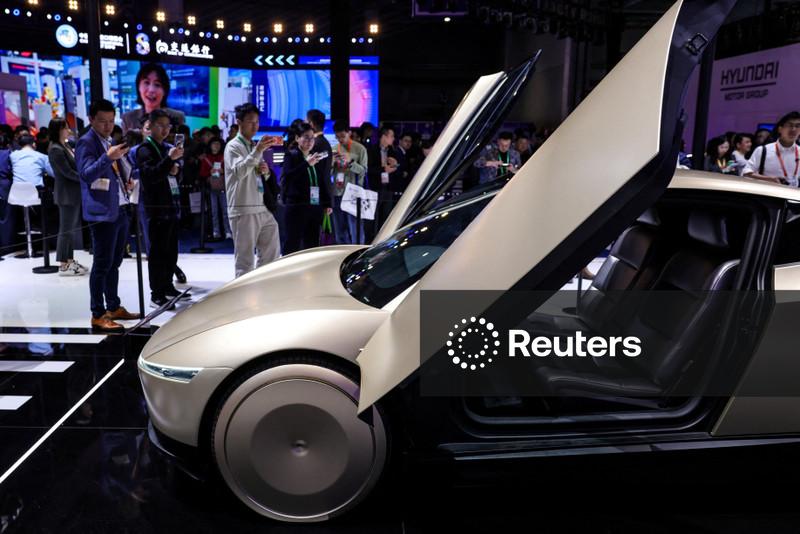 Tesla plans $20 billion capital spending spree in push beyond human-driven cars