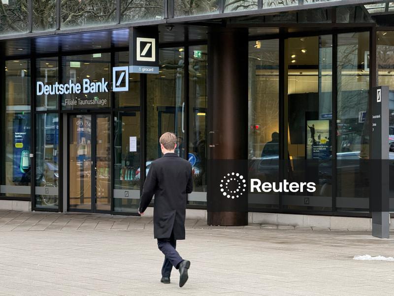 Deutsche Bank, facing probe, posts biggest annual profit in nearly two decades