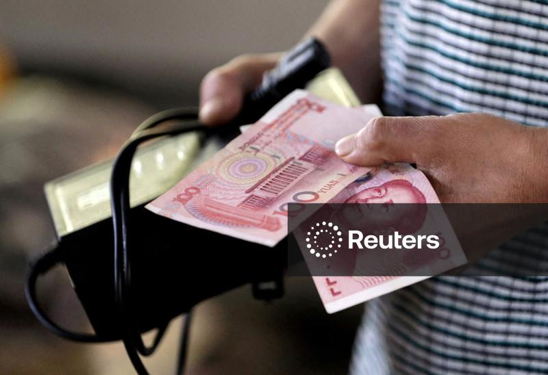 Yuan heads for longest weekly winning streak against dollar in 13 years