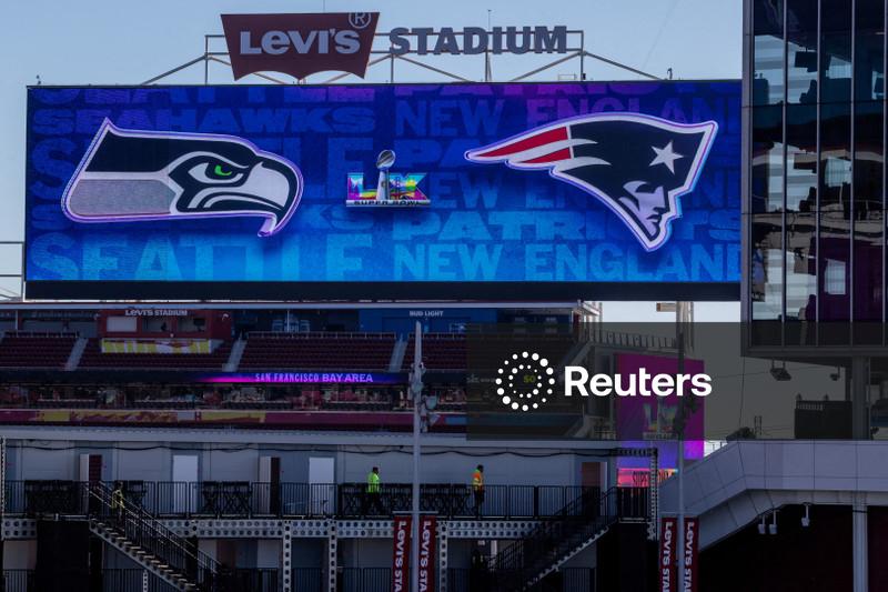 Olympics-US Olympians cheer on Super Bowl teams - in their dreams