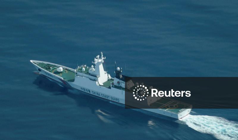 China conducts naval, air patrols around disputed South China Sea