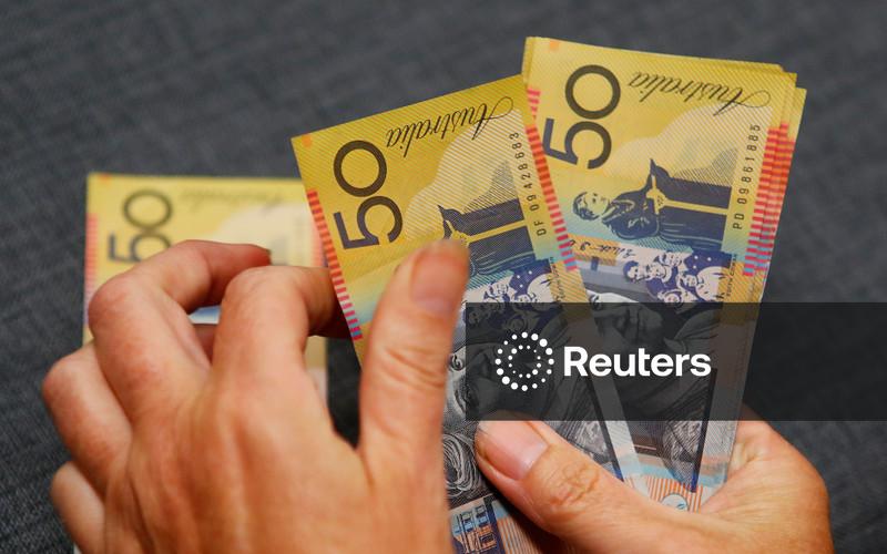Major Australian pension fund says Aussie dollar undervalued, boosts currency holding