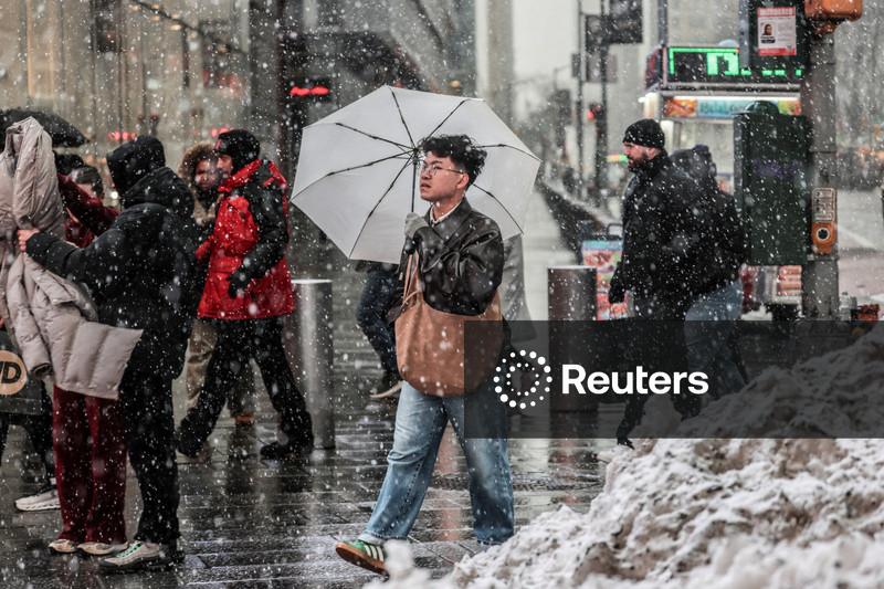 Powerful winter storm shuts schools, disrupts travel across US Northeast