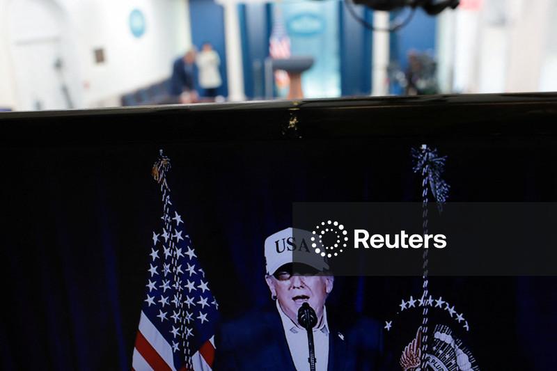 Trump warns Iran of unprecedented force if it retaliates