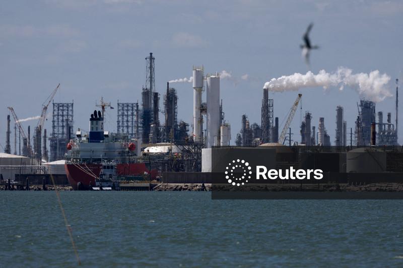 Oil drifts down after OPEC+ agrees to raise output targets