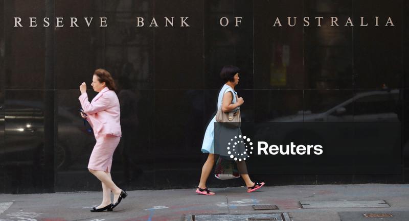 Australia central bank holds rates steady, keeps hike on table