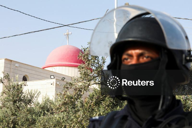 Jordan tightens security after deadly church attack kills eight