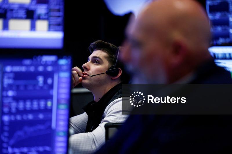 Stocks slump, bonds leap as AI giants' spending spooks investors